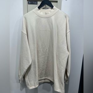 FEAR OF GOD ESSENTIALS
Beige Relaxed Crewneck Sweatshirt